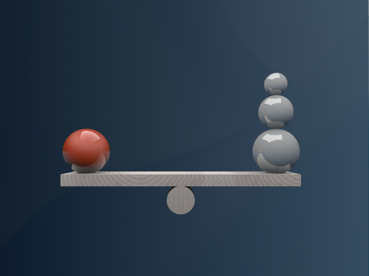 Red sphere balanced against gray shapes